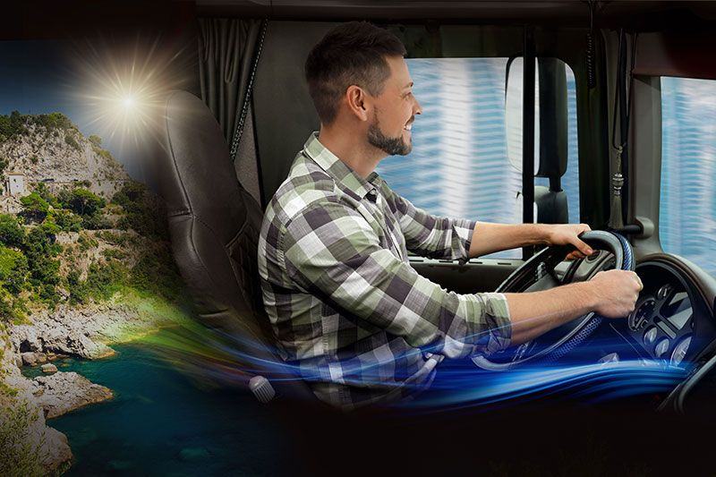 camionista al volante con clima igienizzato